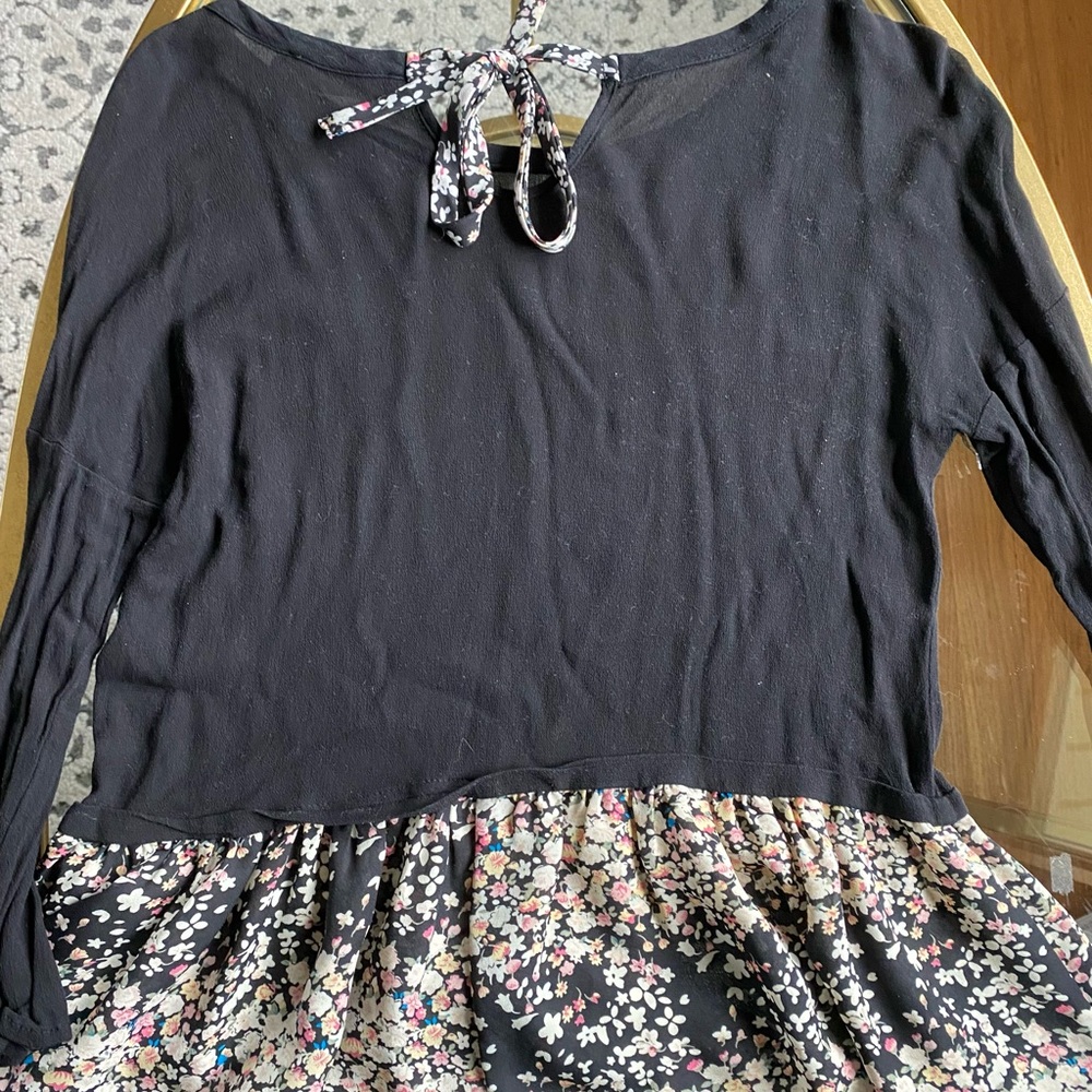 Black Peplum Top with Floral sheet details & bow tie on back